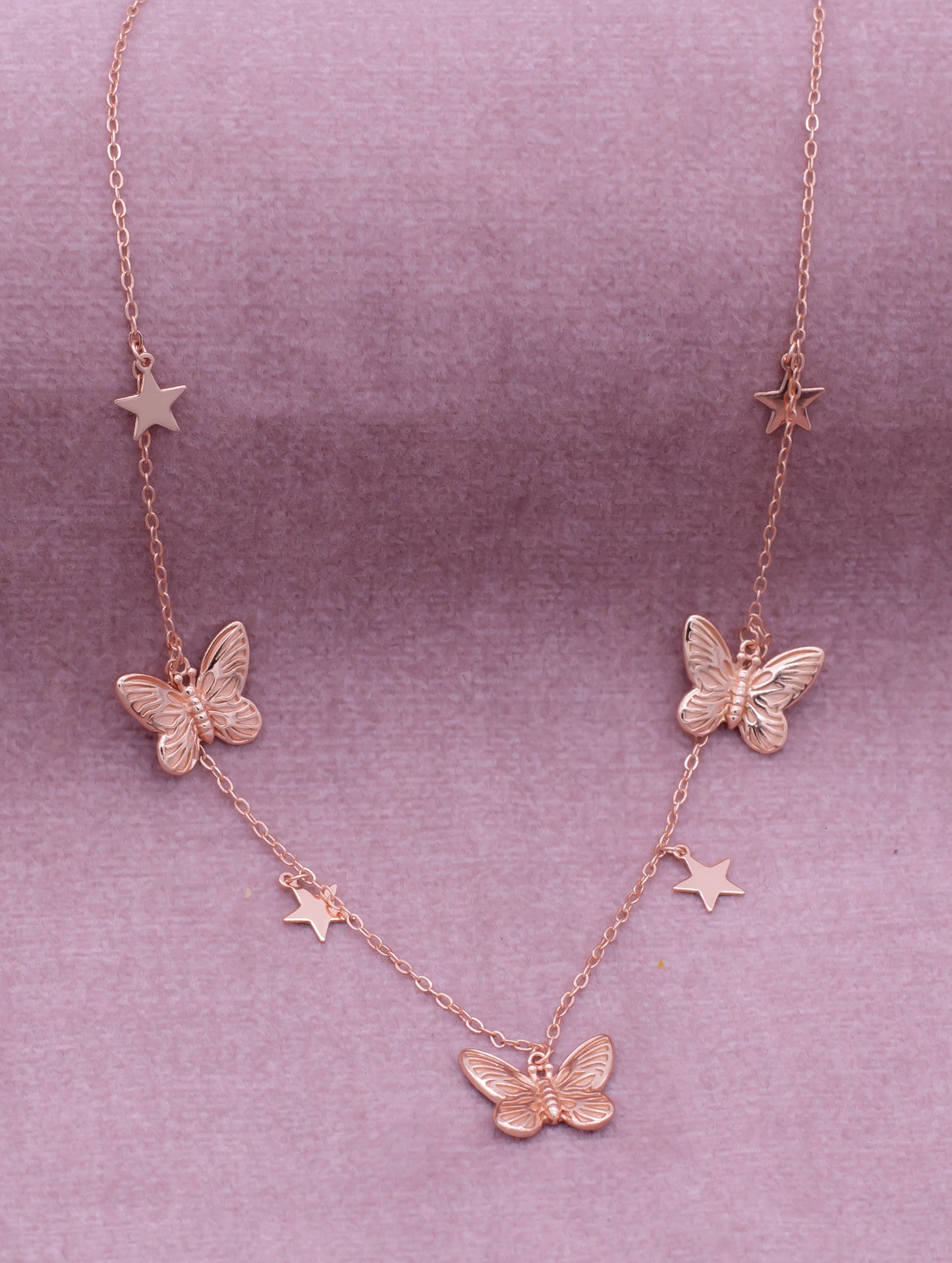 92.5 Sterling Silver Butterfly and Star Charm Necklace in Rose Gold